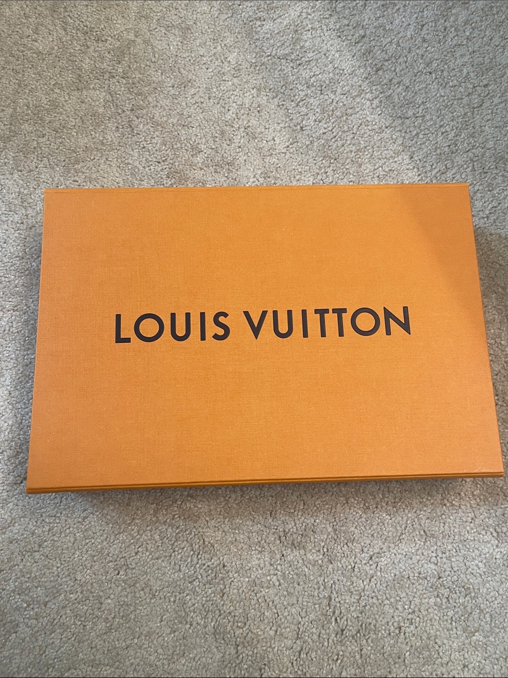 Louis Vuitton Orange Presentation Box with Bold Logo for gifting or storage